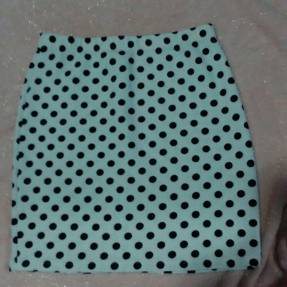 white skirt with black balls